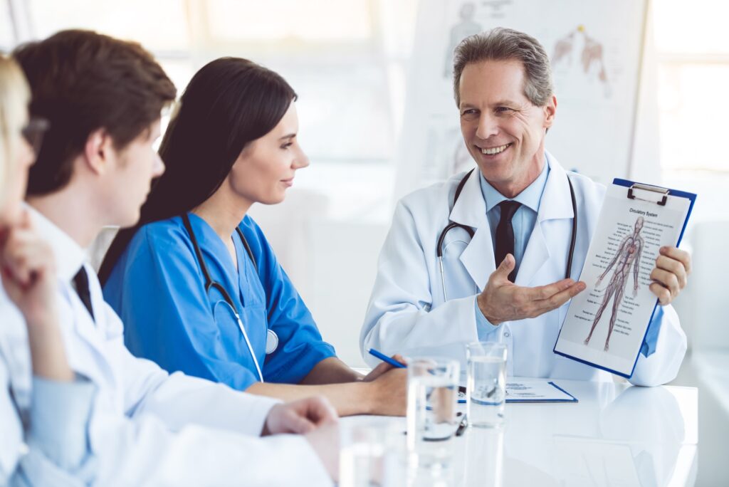 Clinicians reviewing a patient chart together